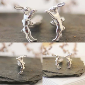 A collection of images of silver hare cufflinks.