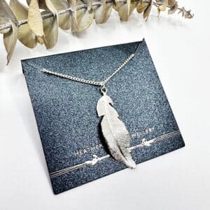Sterling silver feather necklace handmade by Heather Scott Jewellery.