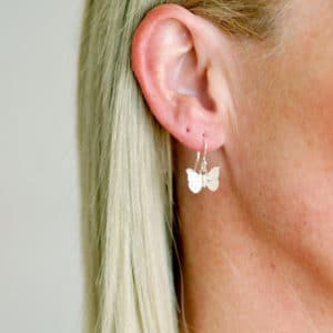 butterfly earrings worn