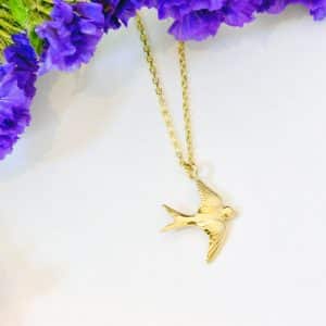 Gold swallow necklace