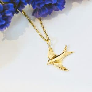 Gold swallow necklace