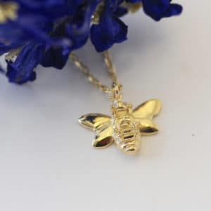 Gold bee necklace reverse
