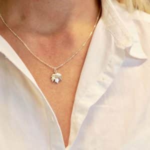 Silver maple leaf necklace worn