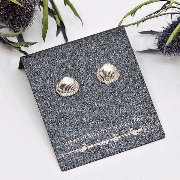 Silver shell stud earrings