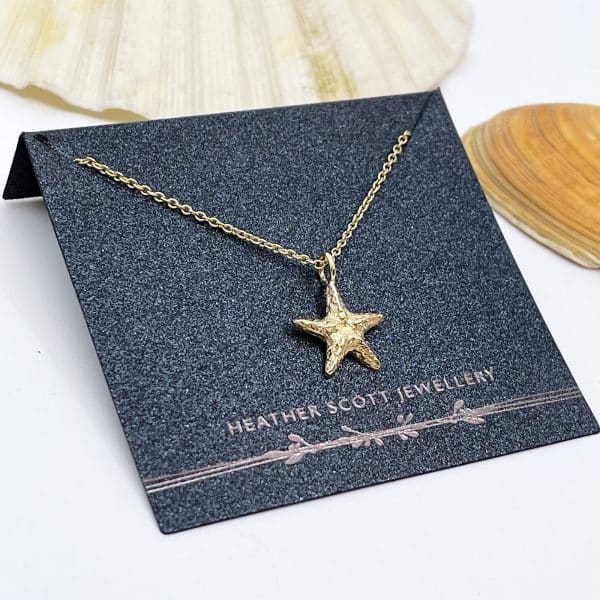 Gold starfish necklace