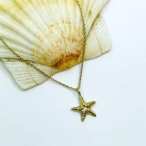 Gold starfish necklace