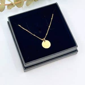 Gold disc necklace boxed