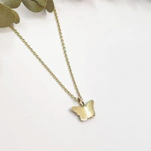 Tiny gold butterfly necklace reverse