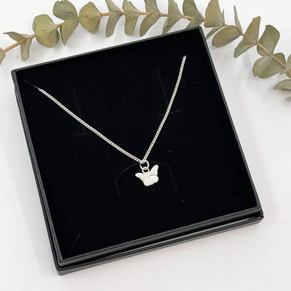 Tiny silver butterfly necklace boxed