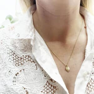 Gold leaf necklace worn