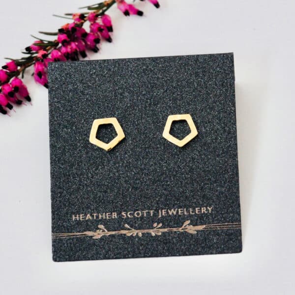 Gold pentagon studs