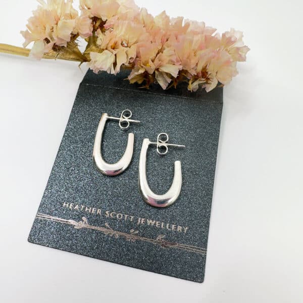 Silver fluid earrings