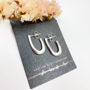 Fluid silver hoop studs