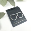 Image of silver facetted hoops made for Heather Scott Jewellery